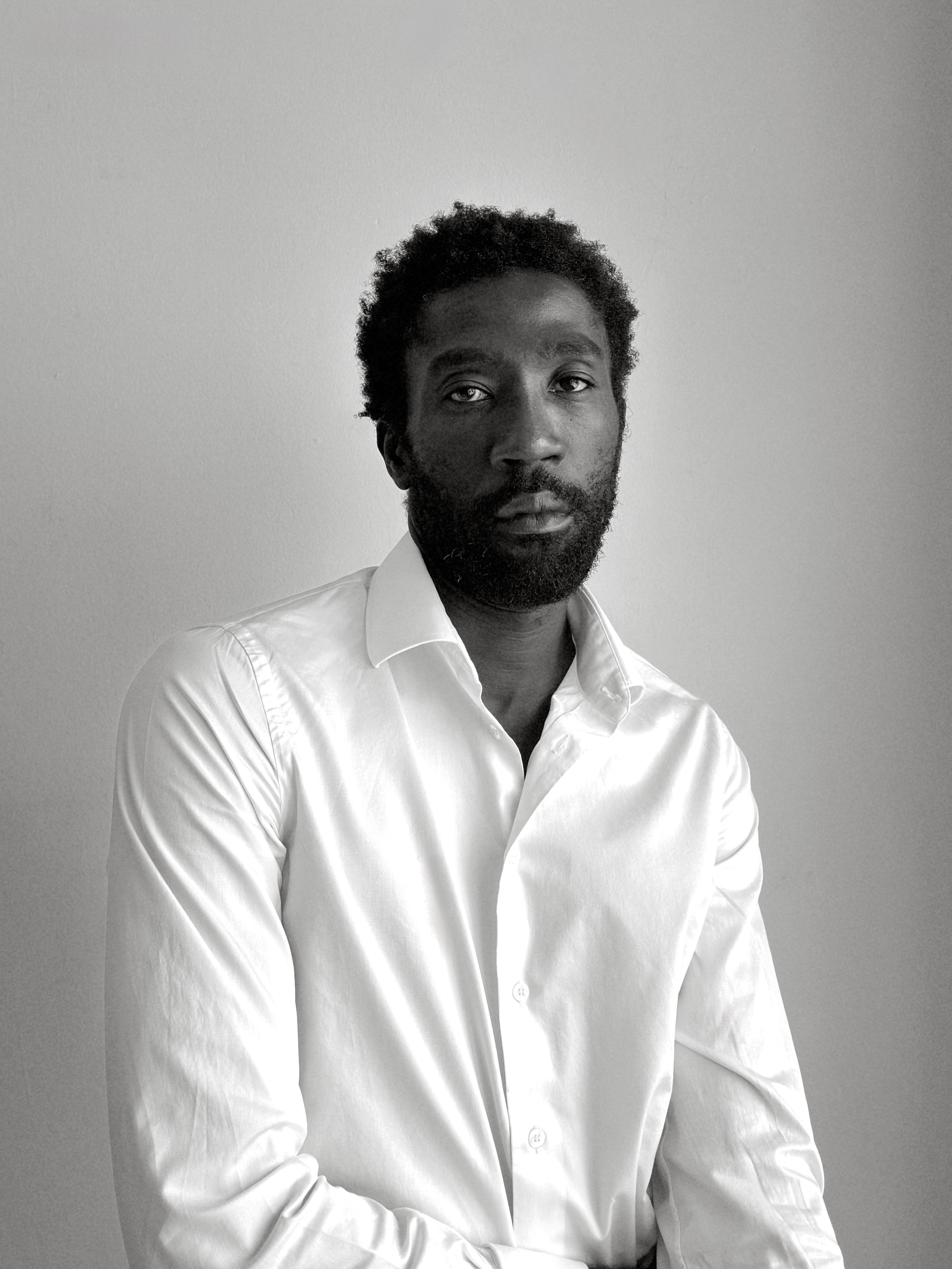 Black-and-white portrait of Camille Tanoh